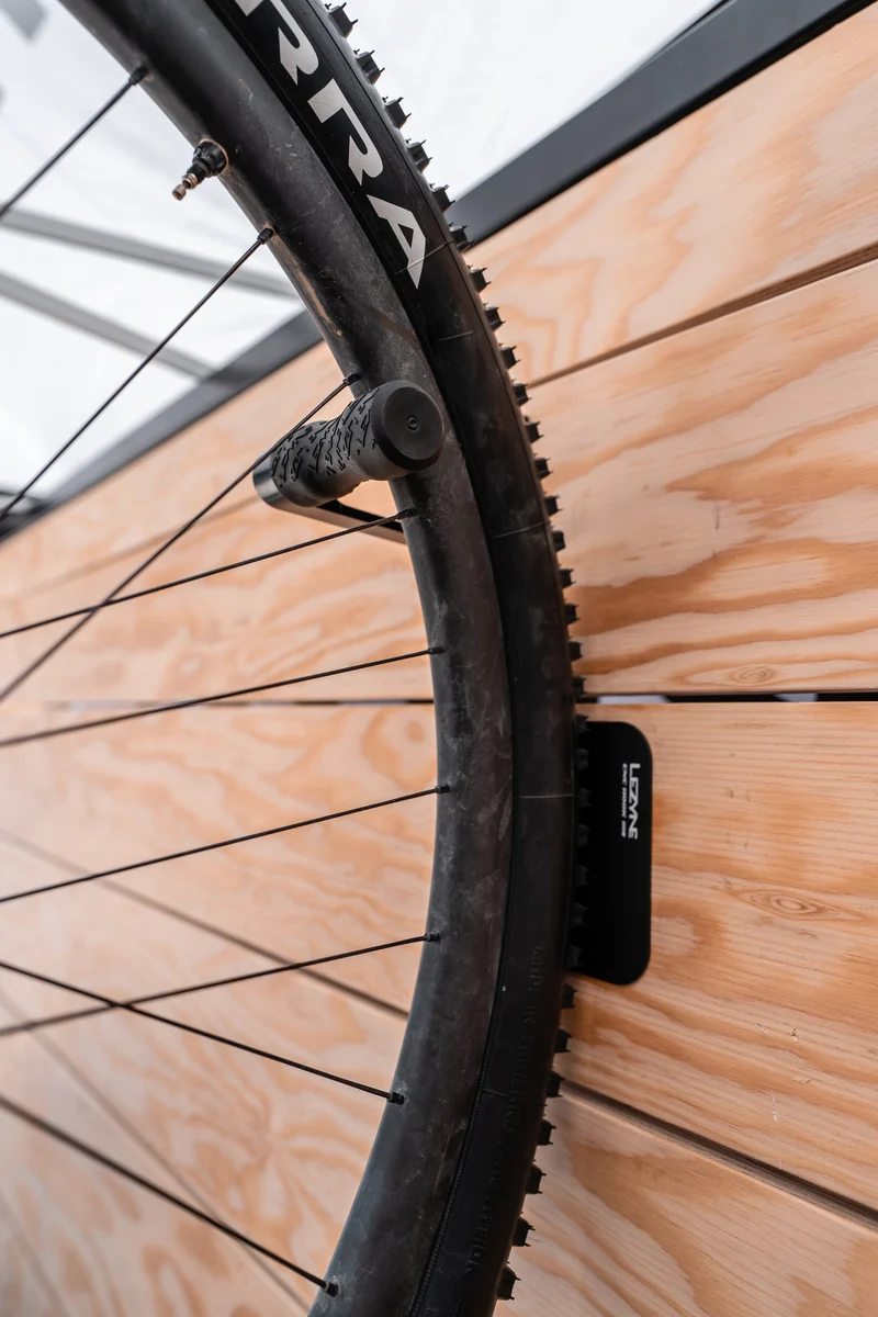 Wall-mounted bike rack with Lezyne CNC aluminum wheel
