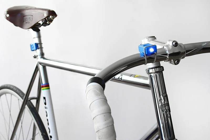 Pair of blue Bookman bicycle lamps