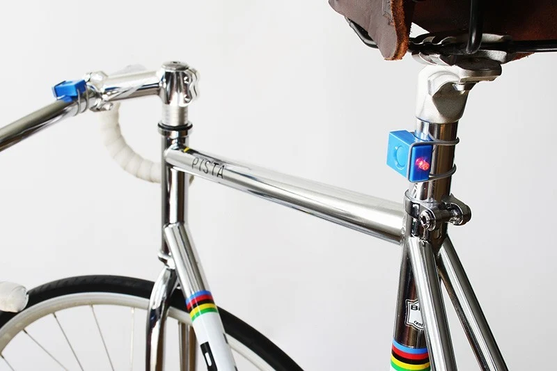 Pair of green Bookman bicycle lamps